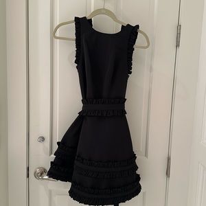 Alexis black ruffled black cocktail dress w/ belt; size XS; NEVER WORN w/ tag